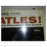 Meet The Beatles album with cellophane and price take. Near mint condition.