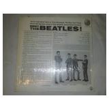 Meet The Beatles album with cellophane and price take. Near mint condition.