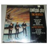 The Beatles something new album in cellophane and price tag with cellophane and price tag near mint.