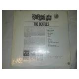 The Beatles something new album in cellophane and price tag with cellophane and price tag near mint.
