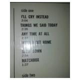 The Beatles something new album in cellophane and price tag with cellophane and price tag near mint.