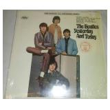 The Beatles yesterday and today with cellophane and price take near-mint album vinyl.