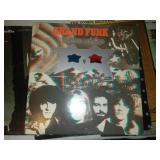 7 rock and roll albums - The Who, Styx, guess who, Grand Funk, Doobie Brothers, Let It Rock - German promo album.