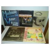 5 Elton John albums.