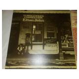 5 Elton John albums.