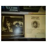 5 Elton John albums.