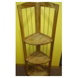 Three tiered corner shelf unit. Unique.