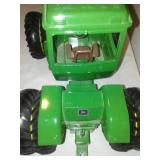 John Deere tractor, 8th wheel, reticulating steering