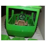 John Deere tractor, 8th wheel, reticulating steering