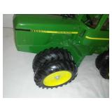 John Deere tractor, 8th wheel, reticulating steering