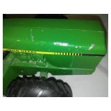 John Deere tractor, 8th wheel, reticulating steering