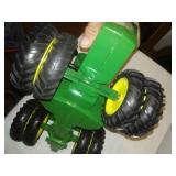 John Deere tractor, 8th wheel, reticulating steering