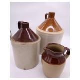Authentic Red Wing Stoneware Pitcher along with two Stoneware North Star Jugs.