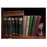 Vintage Library edition of books with Iron ship book end