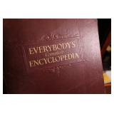 Vintage Library edition of books with Iron ship book end