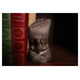 Vintage Library edition of books with Iron ship book end
