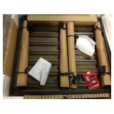 Jasper Ridge Farmhouse Black Frame Rectangular Metal Outdoor Patio Dining Table with Wood Grain Tabletop by Hampton Bay not used whit small damage on the table stock photo used to display the unit