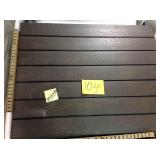 Jasper Ridge Farmhouse Black Frame Rectangular Metal Outdoor Patio Dining Table with Wood Grain Tabletop by Hampton Bay not used whit small damage on the table stock photo used to display the unit