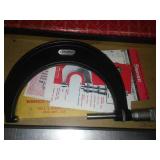 Starrett micrometer 4 inch in box.