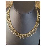 Necklaces by Givenchy on left and Christian Dior on Right