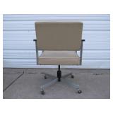 Mid Century Rolling Swivel Armchair