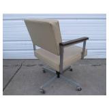 Mid Century Rolling Swivel Armchair