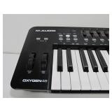 Working M-AUDIO Oxygen 49 Electric Keyboard