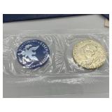 Two 1974 Uncirculated Eisenhower Silver Dollars