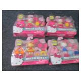 4 Hello Kitty Mini Dolls...