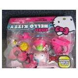 4 Hello Kitty Mini Dolls...