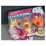 4 Hello Kitty Mini Dolls...