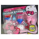 4 Hello Kitty Mini Dolls...