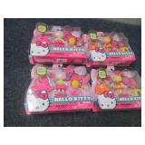 4 Hello Kitty Mini Dolls...