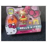 4 Hello Kitty Mini Dolls...