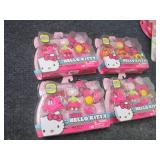 4 Hello Kitty Mini Dolls...