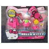 4 Hello Kitty Mini Dolls...