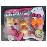 4 Hello Kitty Mini Dolls...