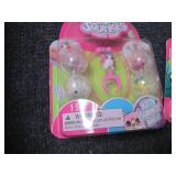 6 Squinkies Toys...