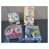 4 Assorted Toys...