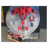 4 Assorted Toys...