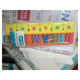 box of glue sticks, name tags, clas...