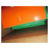 box of orangs,green and red folders...
