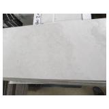 7 cases plus some loose daltile por...