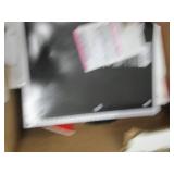 box of printer paper, file folders ...
