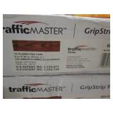9 cases of traffic master gripstrip...