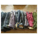 Collection of gloves, scarves, vest and a bag