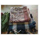 Collection of gloves, scarves, vest and a bag
