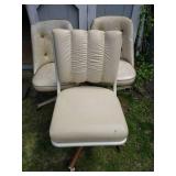 Three Chairs on Wheels