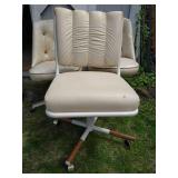 Three Chairs on Wheels