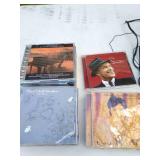 CD Alarm Clock, Wireless Headphones, and CDs